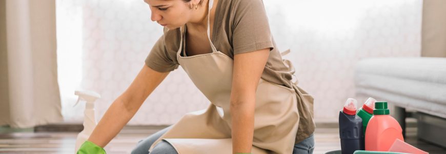 Woman cleaning laminate floor